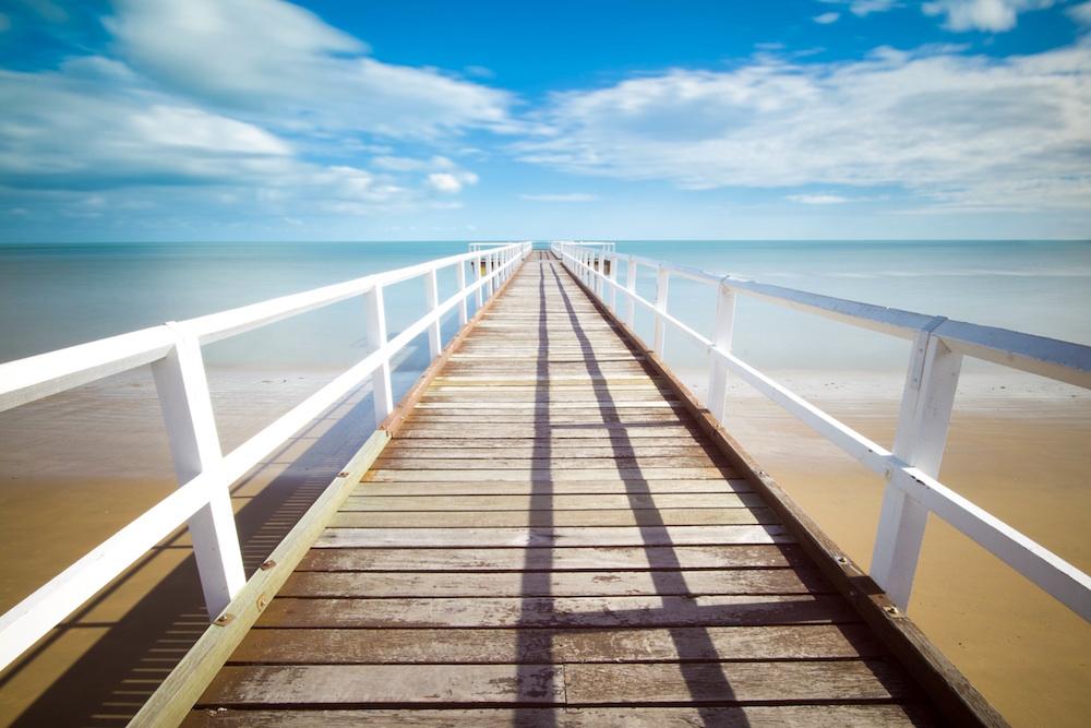 A beachside pier decorates this sample image.